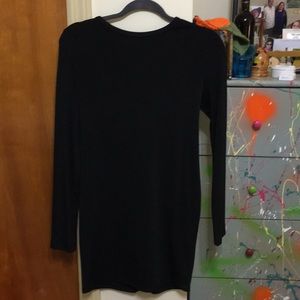 Form fitting black dress with criss-cross backing